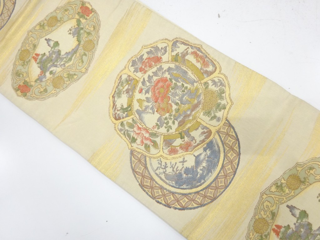 絵皿に草花・風景模様織り出し　袋帯